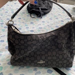 Gray/black Coach purse.